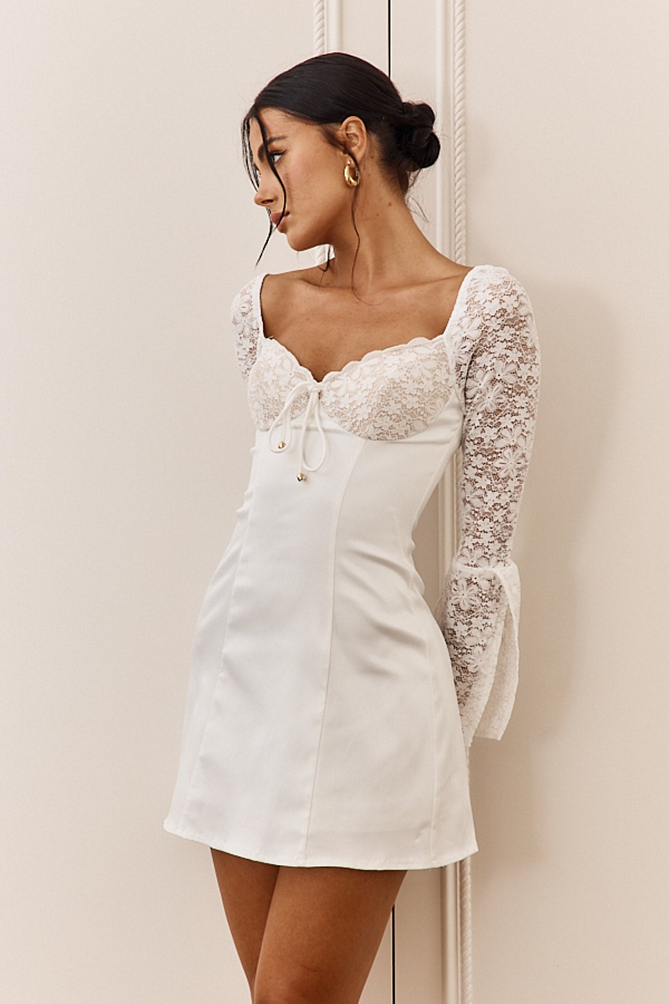 Shop the Ti Amo Lace Bust Long Sleeve Mini Dress White