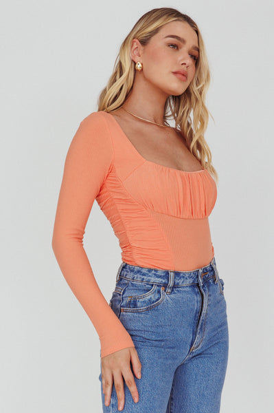 Shop the Bobbi Long Sleeve Ruched Side Ribbed Bodysuit Orange