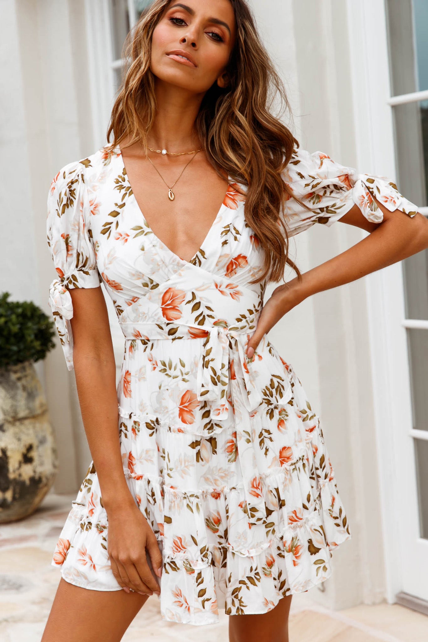 Shop the Jocelyn Short Sleeve Tied Cuff Layered Ruffle Dress Floral Print  White | Selfie Leslie