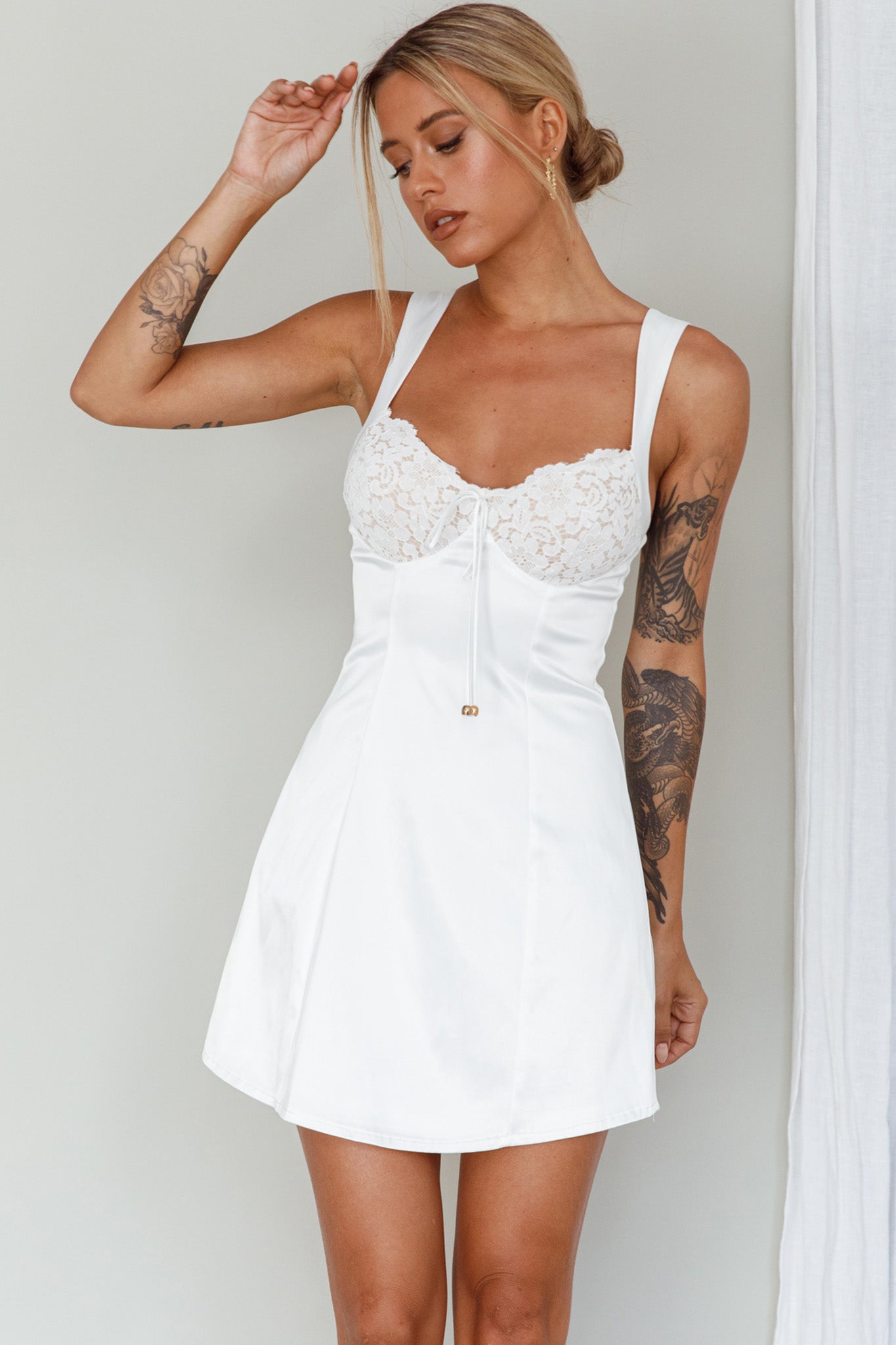 Shop the Ti Amo Lace Bust Mini Dress White