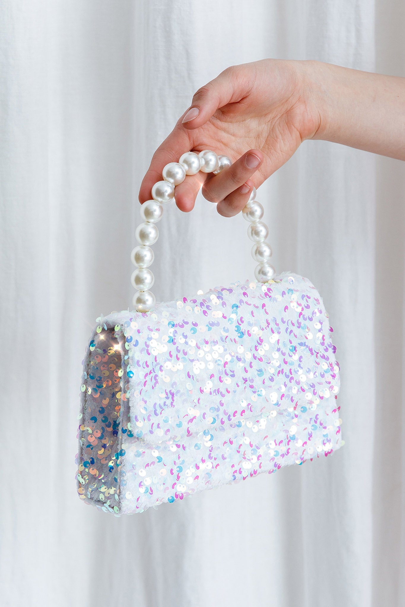 Sequin handbag hi-res stock photography and images - Alamy
